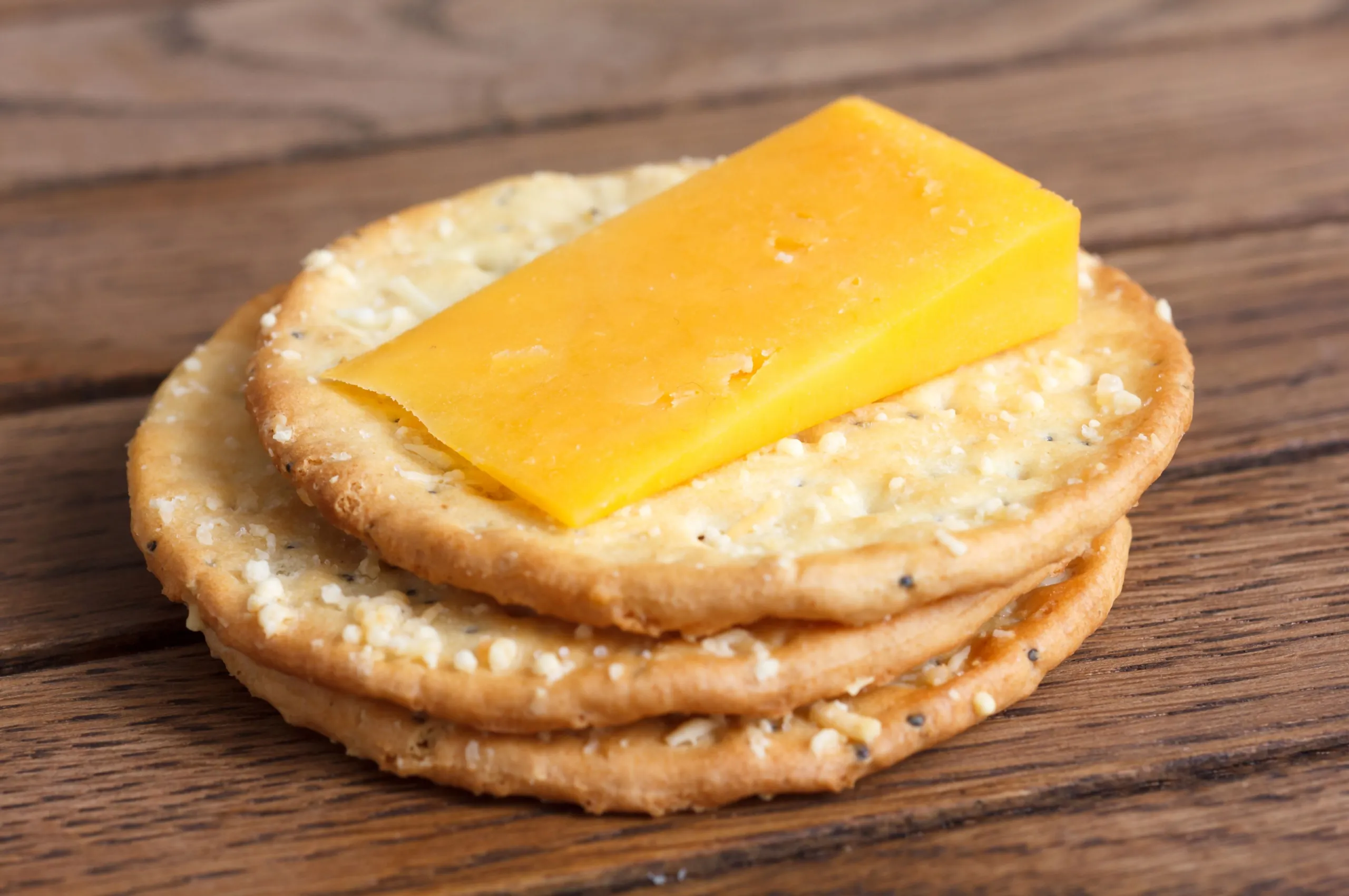 A plate of crackers and cheese